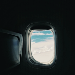 airplane_window_blue_sky_bogota_layover_tour_zebra_fisgona