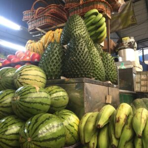 green_fruit_shelf_farmers_market_panoramic_city_tour_zebra_fisgona_bogota