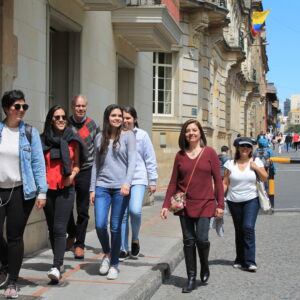 group_walking_historic_district_near_presidential_palace_shared_candelaria_walking_tour_zebra_fisgona_tours_bogota